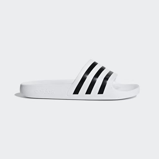Rinse off after the pool in these shower-friendly sandals. Keeping it simple, the smooth slip-ons reveal their adidas DNA with signature 3-Stripes. Soft cushioning rewards tired feet with plush comfort.